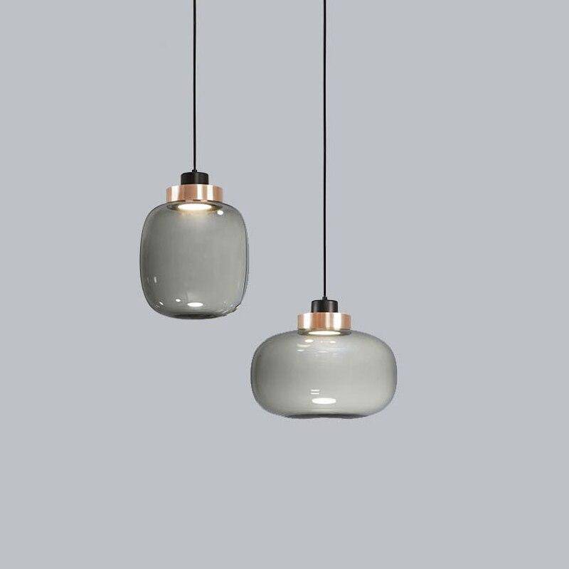 Suspension design LED avec sphère en verre et cercle cuivré