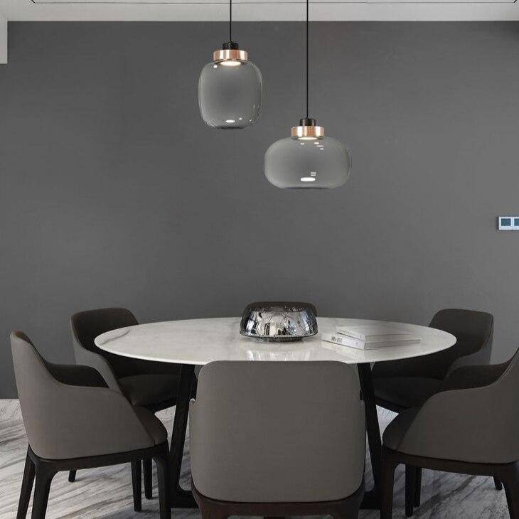 Suspension design LED avec sphère en verre et cercle cuivré