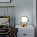 Lampe à poser dorée à led boule en verre