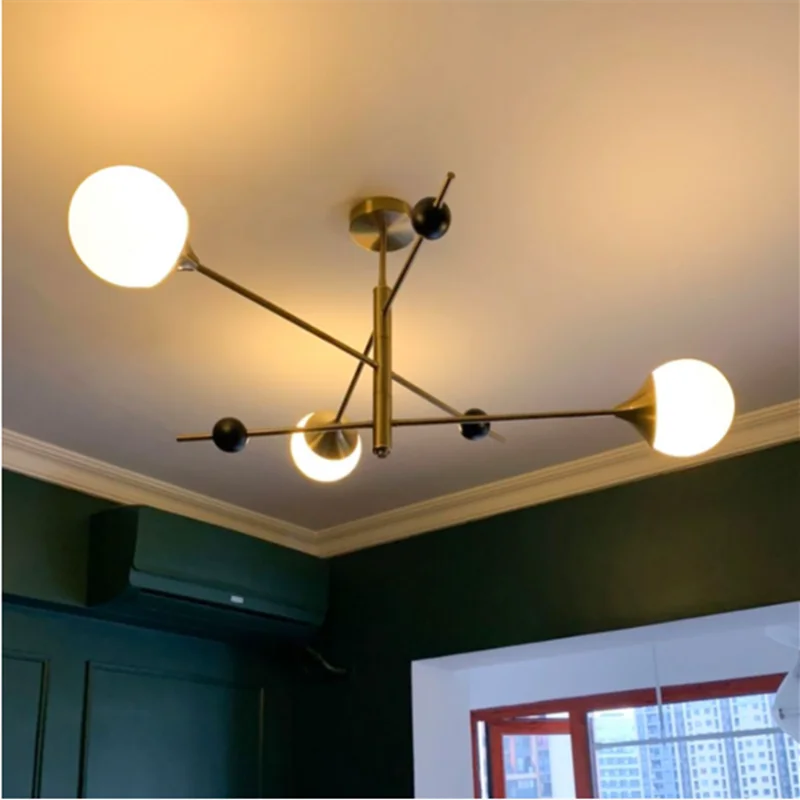 lustre orbital vintage à trois niveaux style minimaliste intérieur