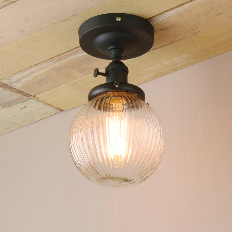 Plafonnier vintage industriel avec boule en verre