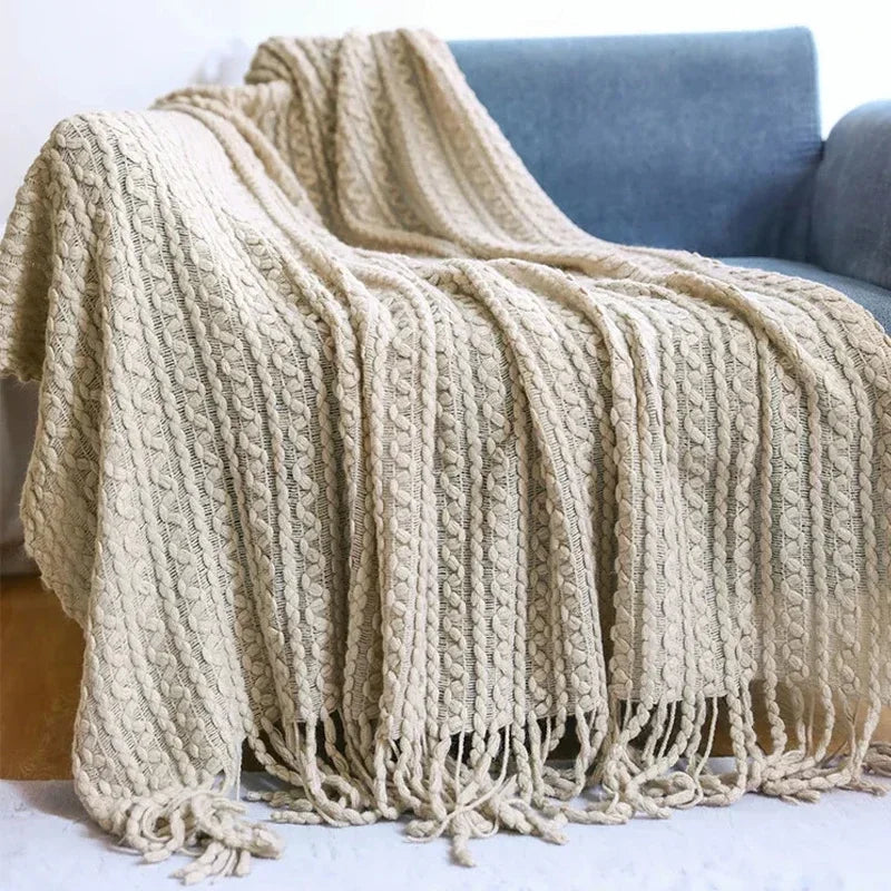 plaid bohème à carreaux avec pompons pour salon