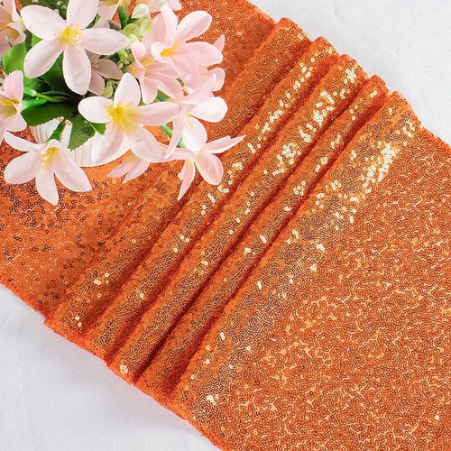 Chemin de table orange à paillettes décoration fêtes