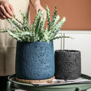 pot de fleurs en ciment style nordique avec plateau décoratif