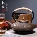 theiere japonaise fonte emaillee avec infuseur filtre maille
