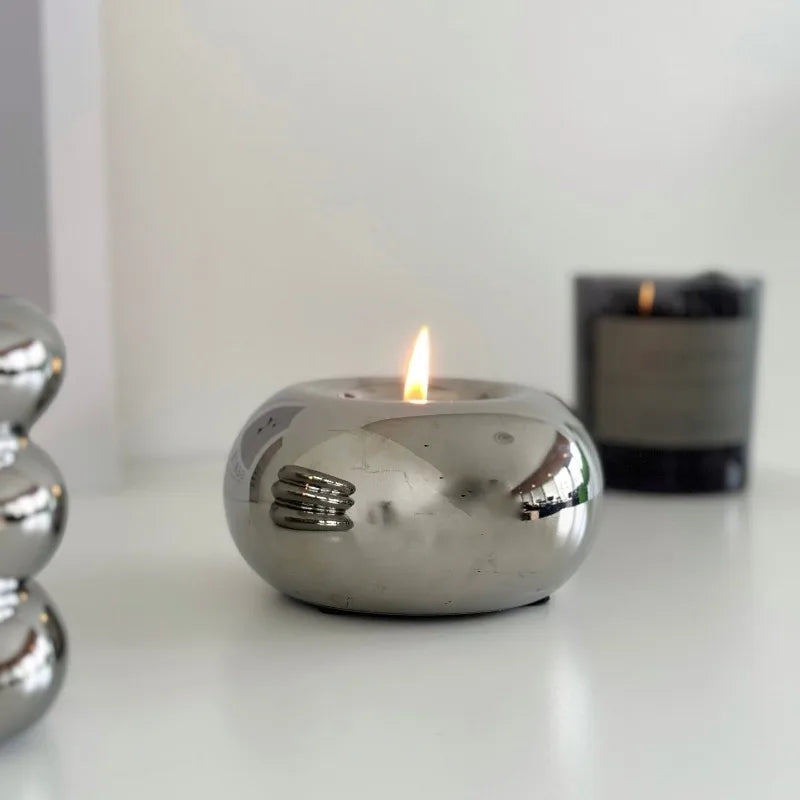 lustre moderne en céramique argentée avec bougies décoratives