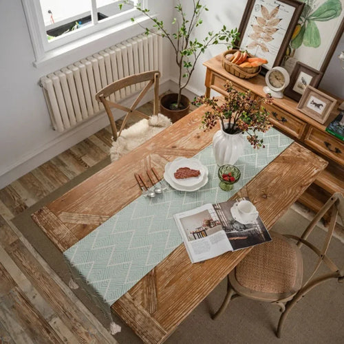 Chemin de table jacquard géométrique beige à pompons