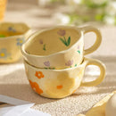 Mug ceramique artisanal motif fleurs forme irreguliere 300ml