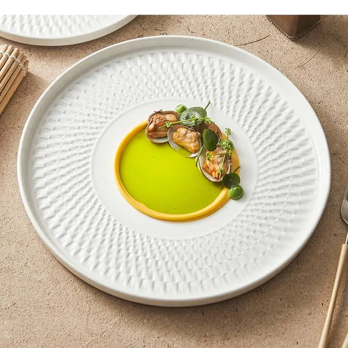 Assiette ceramique texturee relief style artisanal service