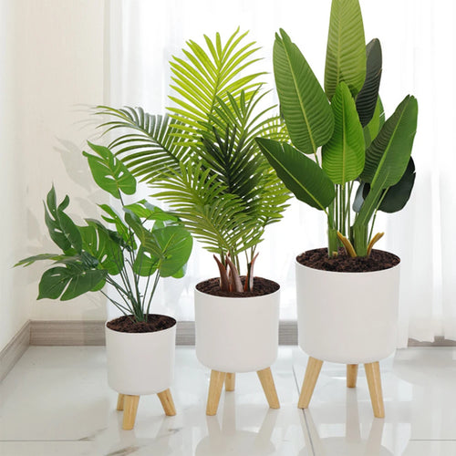 pot de fleurs rond sur pied avec arrosage automatique et drainage