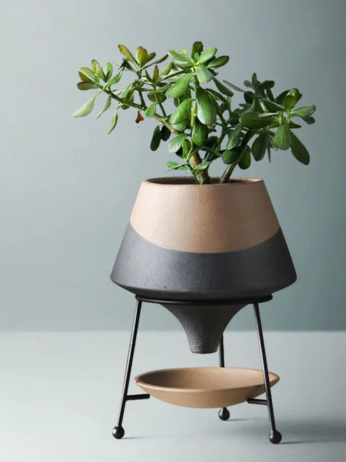pot de fleurs en céramique avec support en métal moderne