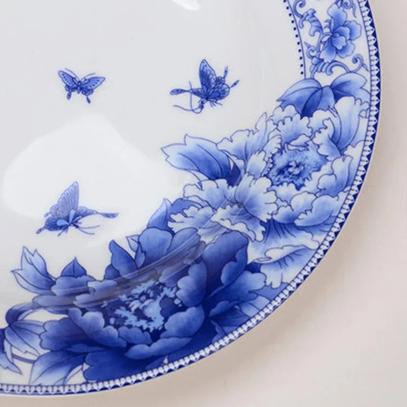 Assiettes porcelaine style chinois motifs floraux poisson