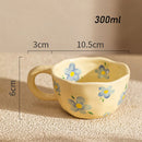 Mug ceramique artisanal motif fleurs forme irreguliere 300ml