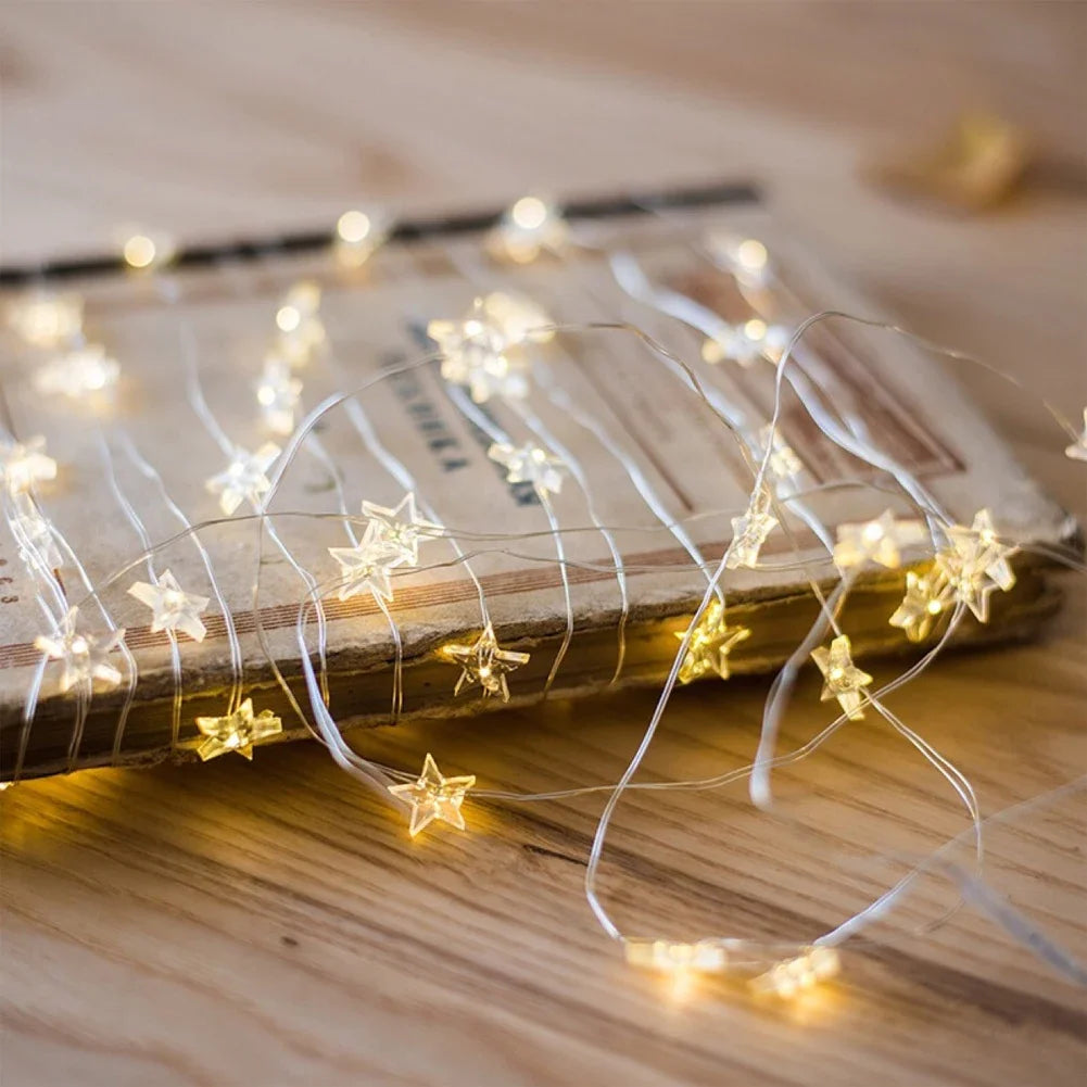 Guirlande lumineuse en cuivre avec étoiles décoratives à piles