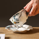 Tasses et soucoupes motifs fleurs oiseaux céramique main