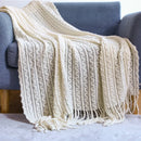 Plaid nordique carreaux style boheme doux pompons