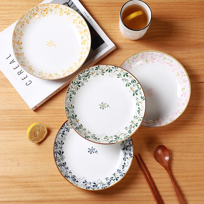 Lot 4 assiettes ceramique motifs floraux 20 cm