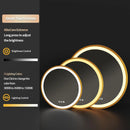 miroir rond éclairé avec cadre doré et fonction mémoire