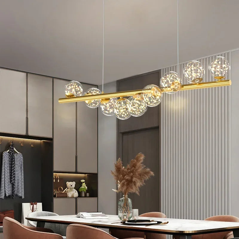 lustre nordique longue boule de verre or pour bar