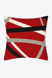 housse de coussin noire et rouge à motif géométrique