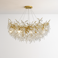 lustre moderne en cristal clair avec éclairage en métal réglable