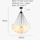 lustre-moderne-en-m-tal-avec-boule-en-verre-et-bulles-d-coratives-6.png