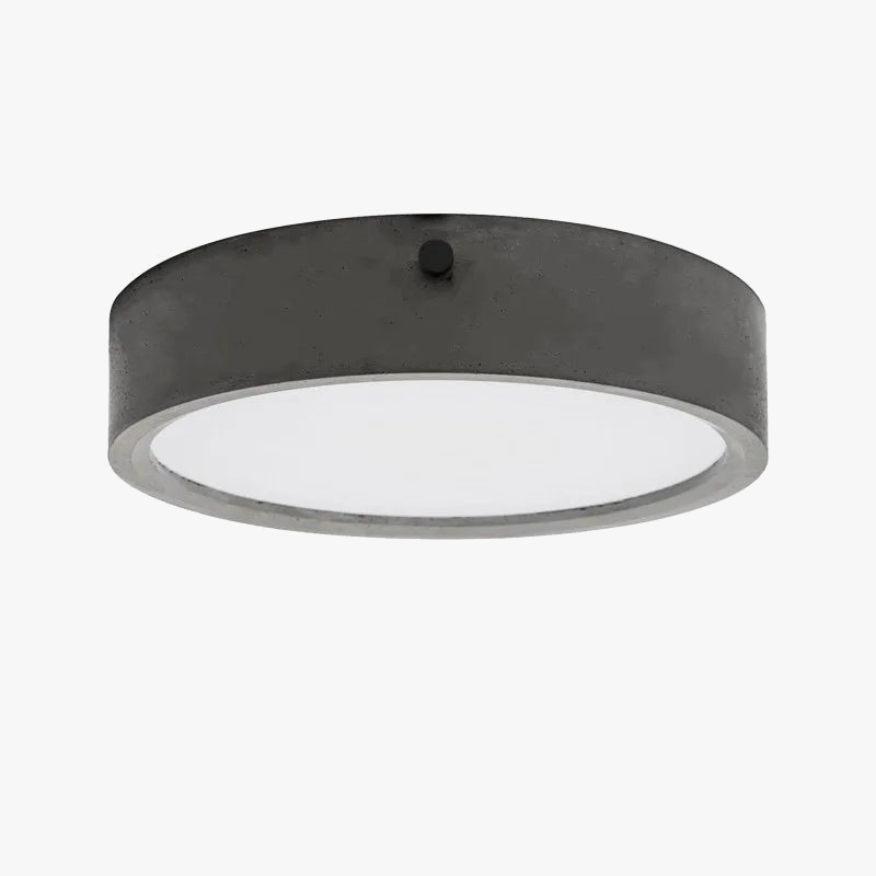 plafonnier rond en ciment style industriel pour tous espaces