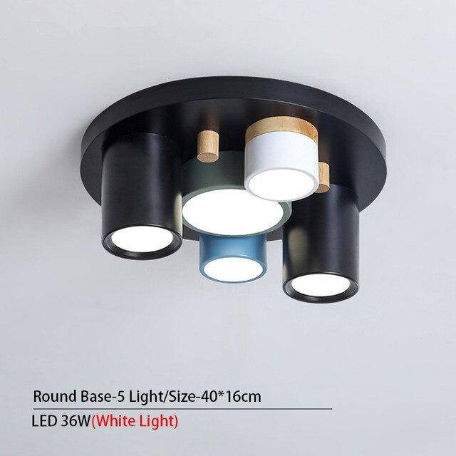 Plafonnier design avec plusieurs spots cylindriques colorés à LED