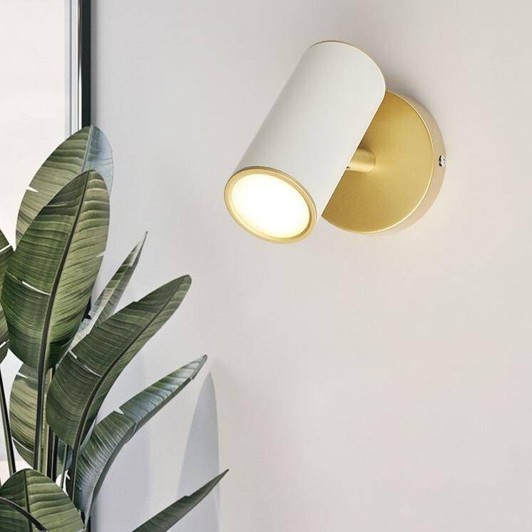 Applique murale LED avec spot cylindrique en métal doré