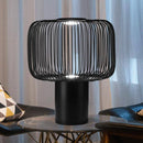 Lampe à poser design à LED avec abat-jour cage arrondie en métal noir