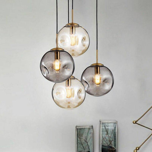 Suspension design à LED boule déformée en verre Head