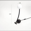Lampe à poser design LED en marbre et métal courbé