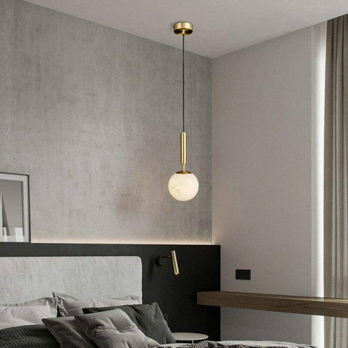 Suspension design LED dorée avec boules en marbre