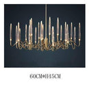 Lustre design LED avec tiges dorées et verre style Hotel