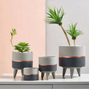 Cache-pot sur pied bas design effet ciment Ultra