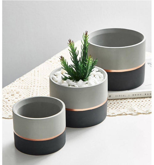 Cache-pot sur pied bas design effet ciment Ultra