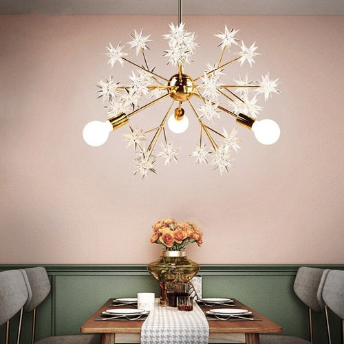 Lustre moderne métallique avec des étoiles étincelantes Tanit