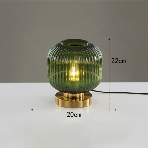 Lampe à poser cylindrique en verre coloré et base dorée Quinn
