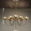 Lustre design industriel doré avec boule en verre