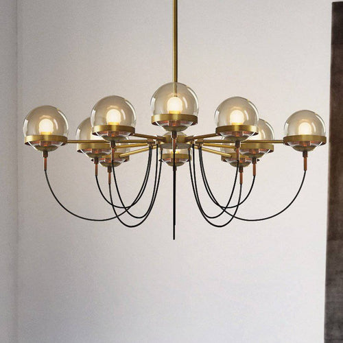 Lustre design industriel doré avec boule en verre