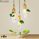 Suspension LED en bois avec plante et réservoir d'eau Bottle