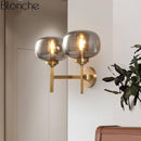 Applique murale design LED dorée et abat-jour en verre Sconce